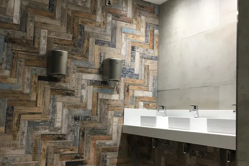 Hospitality washroom lighting and hand dryers
