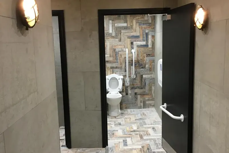 Hospitality washroom lighting and hand dryers