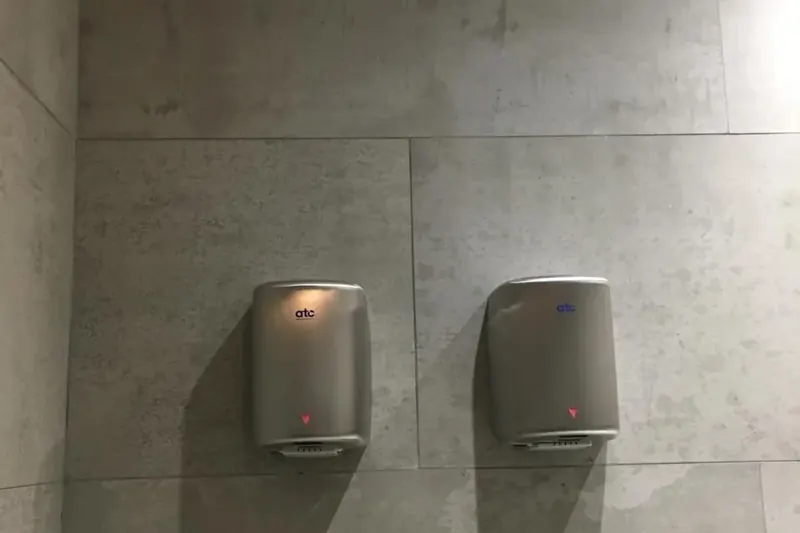 Hospitality washroom lighting and hand dryers