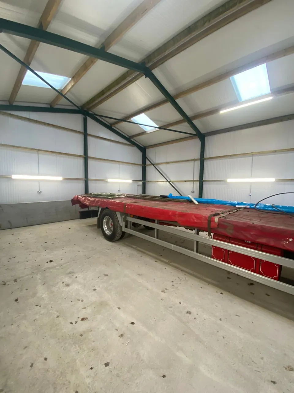 Vehicle storage building lighting and power