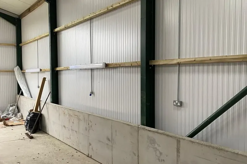 Vehicle storage building lighting and power