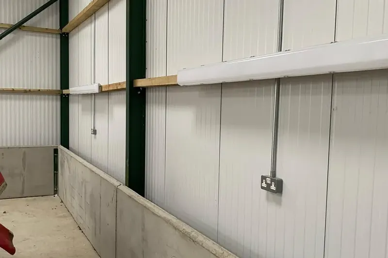 Vehicle storage building lighting and power