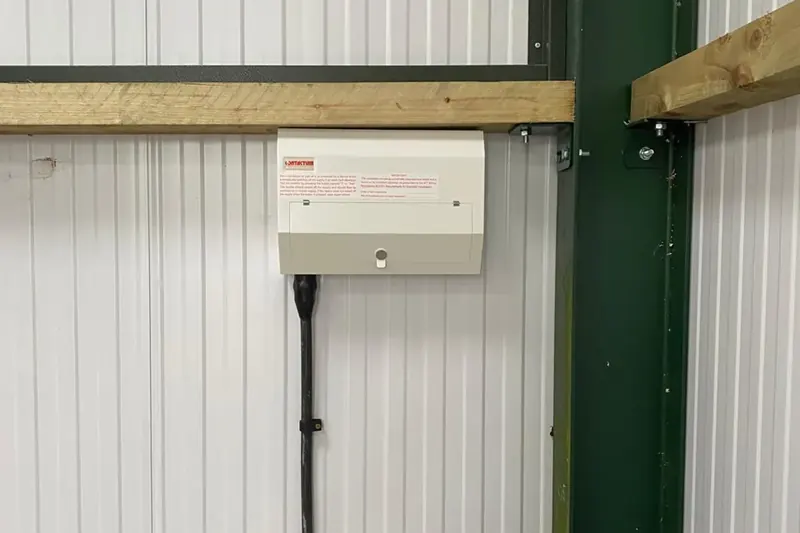 Vehicle storage building lighting and power