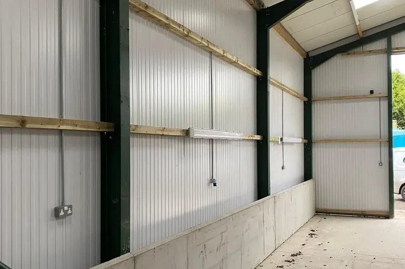 Vehicle storage building lighting and power